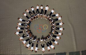 Age paradox: youth athletes in adult tournaments